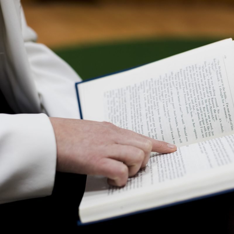 back-school-concept-with-close-up-woman-studying-library